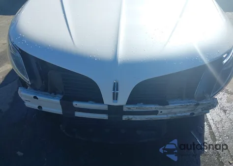 2014 Lincoln Mks z USA, uszkodzony, nr VIN 1LNHL9EK5EG607949